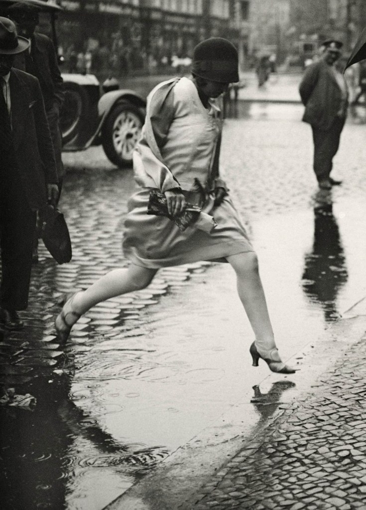 Friedrich Seidenstücker (1882-1966) 'Woman Jumping Puddle, Berlin' 1925