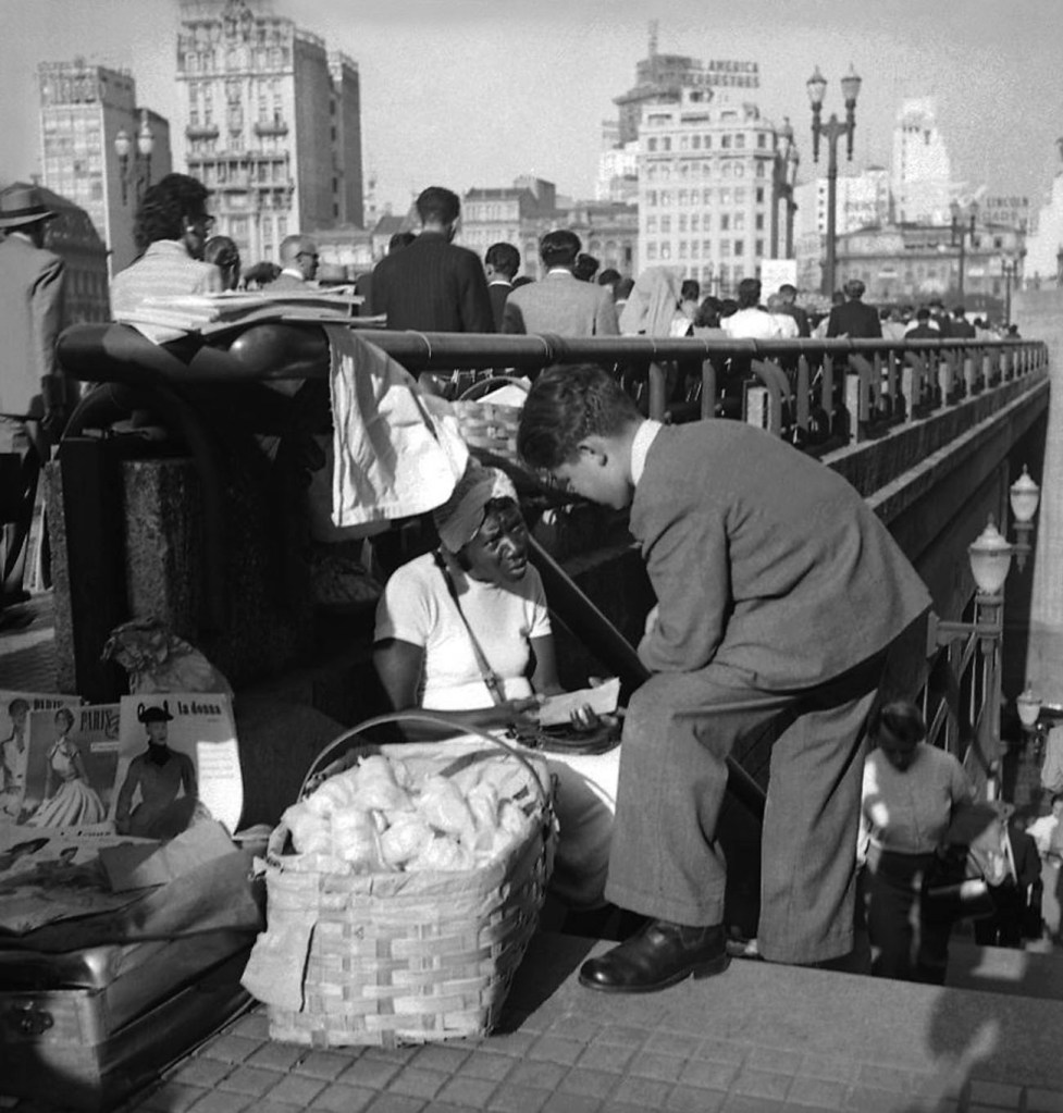 Alice Brill (Brazilian born Cologne, 1920-2013) 'Street Vendor at the Chá Viaduct, São Paulo' c. 1953