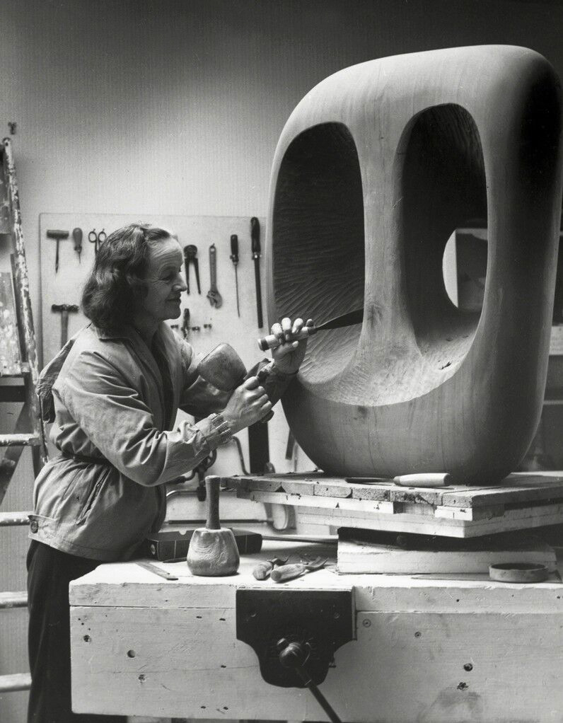 Val Wilmer. 'Barbara Hepworth in the Palais de la Danse studio, St Ives, at work on the wood carving 'Hollow Form with White Interior'' 1963