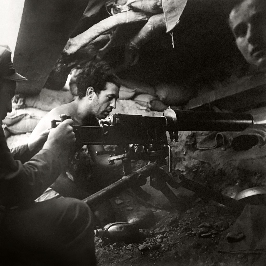 Kati Horna (Mexican born Hungary, 1912-2000) 'Sin titulo (Milicianos en una trinchera / Militiamen in a trench) '1937-1938