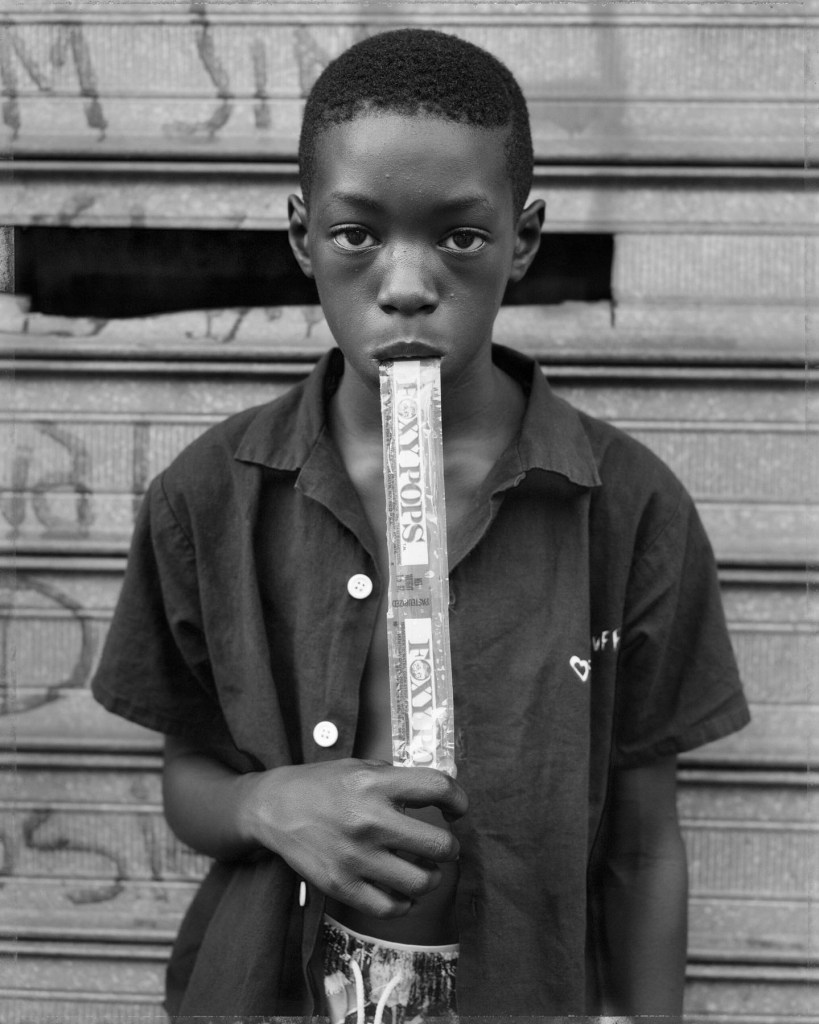 Dawoud Bey (American, b. 1953) 'A Boy Eating a Foxy Pop, Brooklyn, NY' 1988, printed 2019