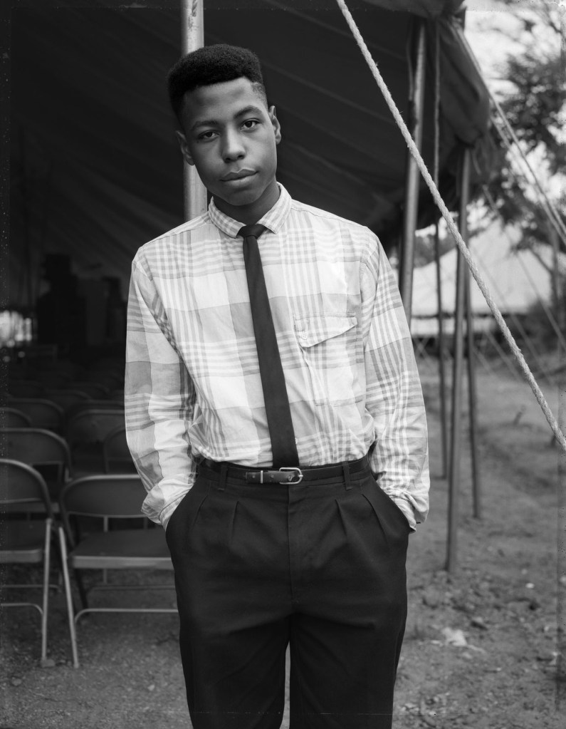 Dawoud Bey (American, b. 1953) 'Young Man at a Tent Revival, Brooklyn, NY' 1989, printed 2019