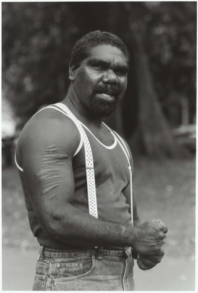 Mervyn Bishop (Australian, b. 1945) 'Aboriginal Australian Gerard Rice at the Rally, Sydney' 1989, reproduction 2014
