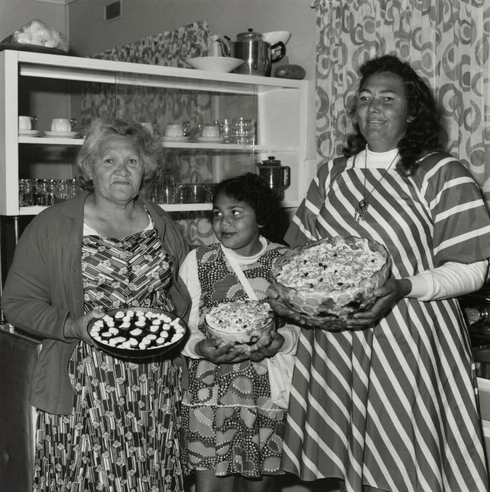 Mervyn Bishop (Australian, b. 1945) 'Three Aboriginal women holding cakes, Mungundi, New South Wales' 1976, reproduction 2014