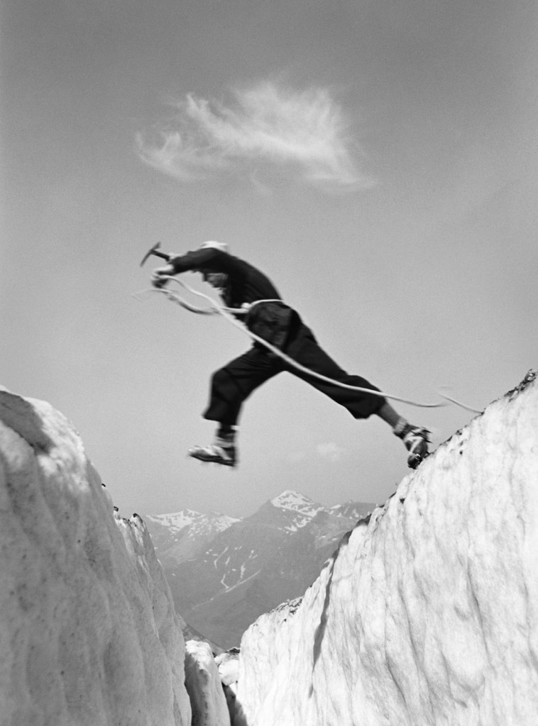 Ernst A. Heiniger (Swiss, 1909-1993) 'Jumping over a crevasse, Bernese Oberland' 1933