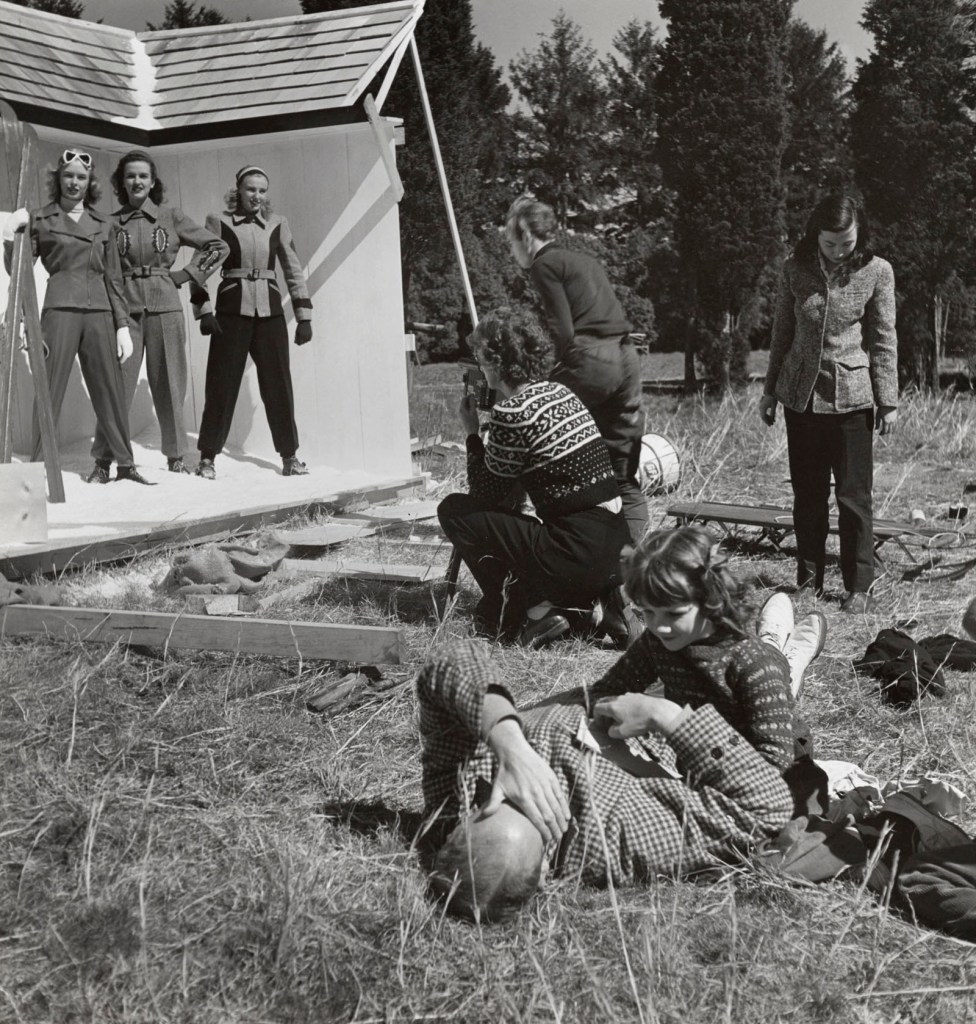 Frances McLaughlin-Gill (American, 1919-2014) 'Untitled (Toni Frissell photographing three models at a fashion shoot with her husband and daughter in the foreground)' c. 1940