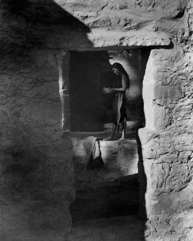 Laura Gilpin (American, 1891-1979) 'Untitled (Pueblo dwelling, woman holding a bowl)' c. 1930