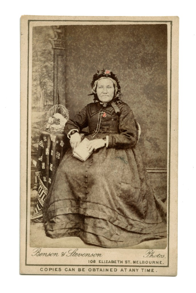 Benson & Stevenson (Australian) 'Untitled (Seated woman holding book)' c. 1872-1880