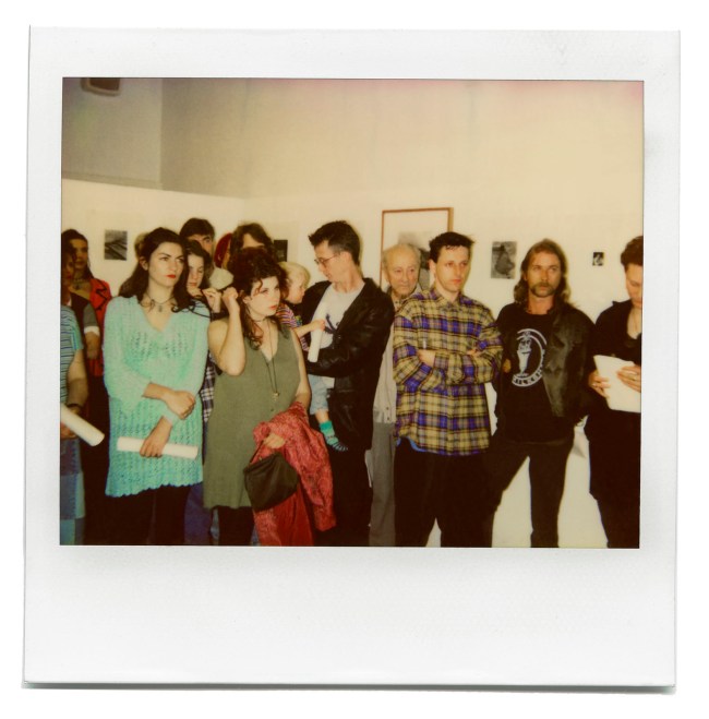 Unknown photographer. 'Opening of Marcus Bunyan's exhibition 'The Naked Man Fears No Pickpockets' at The Photographers' Gallery and Workshop, Melbourne, 1993 showing at left (behind the crowd) the photograph 'Richmond Steps' 1993' 1993