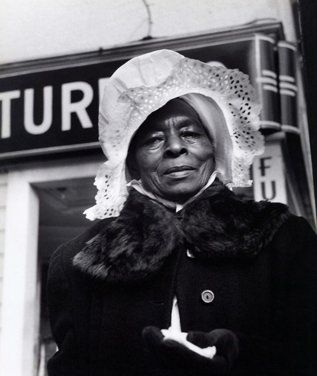 Imogen Cunningham (American, 1883-1976) 'Sunbonnet Lady, Fillmore Street, San Francisco' c. 1950s