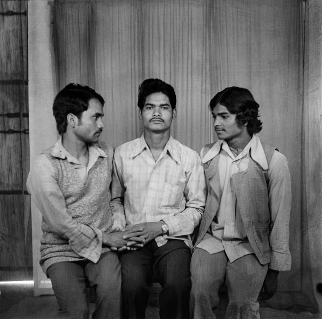 Suresh Punjabi (Indian, b. 1957) 'Untitled (Seated portrait of three friends) Suhag Studio, Nagda, Madhya Pradesh' 1979