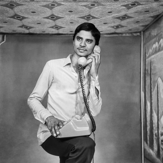 Suresh Punjabi (Indian, b. 1957) 'Untitled (Portrait of a man posing with a telephone) Suhag Studio, Nagda, Madhya Pradesh' 1985