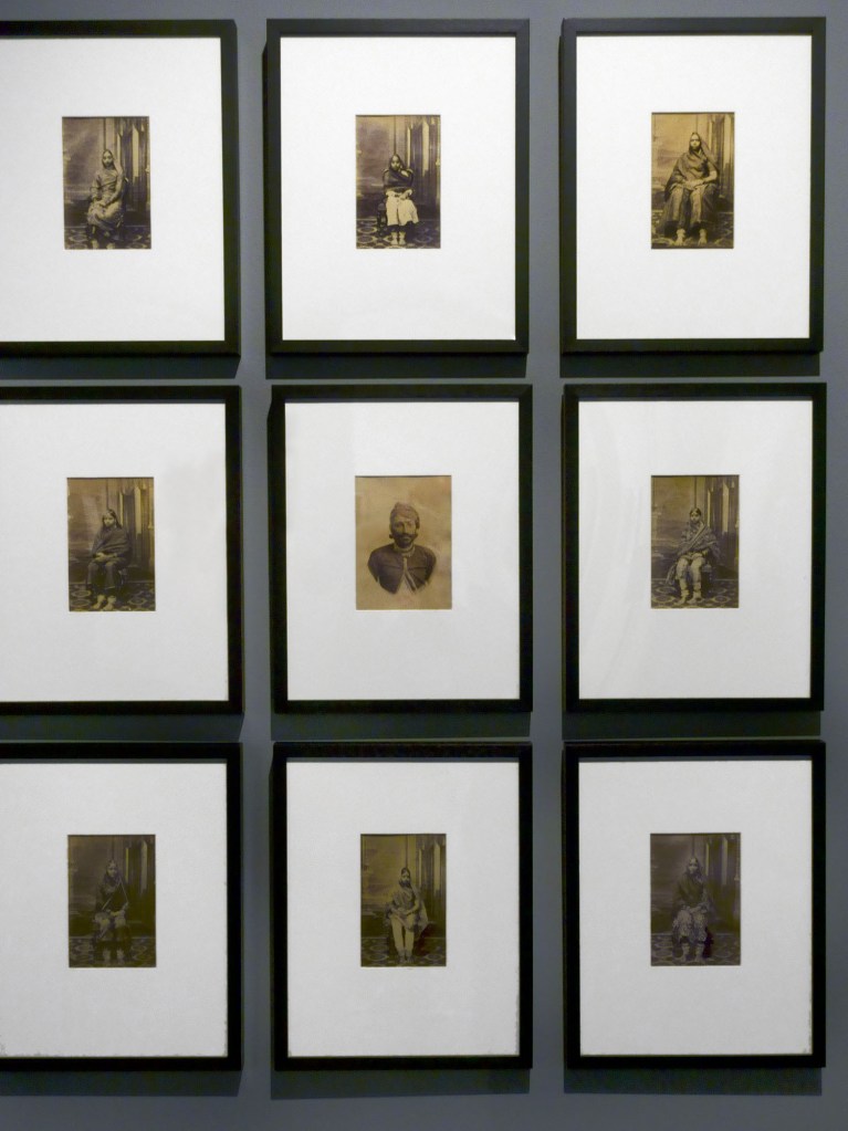 Installation view of Sawai Ram Singh II, Maharaja of Jaipur showing his self-portrait (c. 1860, centre) and portraits of courtesans (c. 1860)