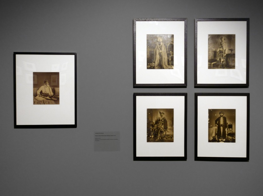 Installation view of the exhibition 'Visions of India: from the colonial to the contemporary' at the Monash Gallery of Art showing at left, Johnston & Hoffmann's 'Maharao Raja Sir Ramsinghji, Bahadur of Bondi' (1887): and at right, four images by Layla Deen Dayal (c. 1880) from the album 'Princes and Chiefs of India'