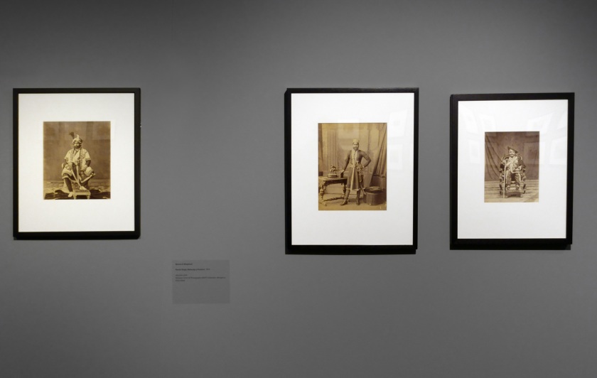 Installation view of the exhibition 'Visions of India: from the colonial to the contemporary' at the Monash Gallery of Art showing at left, Bourne and Shepherd. 'Ranbir Singh Maharaja of Kashmir' (1875); at centre right, Unknown photographer. 'Unidentified Maharaja' (c. 1880); and at right, Unknown photographer. 'HH Maharaja Shrimant Sir Anandrao III Puar Sahib Bahadur, Maharaja of Dhar' (c. 1870)
