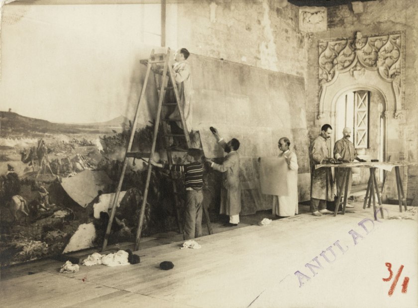 Adolf Mas (Spanish, 1861-1936) 'Relining of "La Batalla de Tetuan" by Marià Fortuny in one of the halls of the Diputació Provicial' 1914