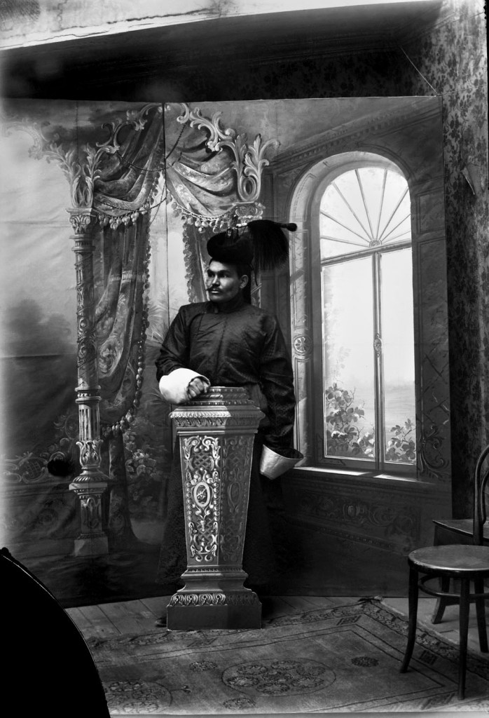 Unknown photographer. 'Untitled [Mongolian man with cut-out pedestal]' 1910s-1920s