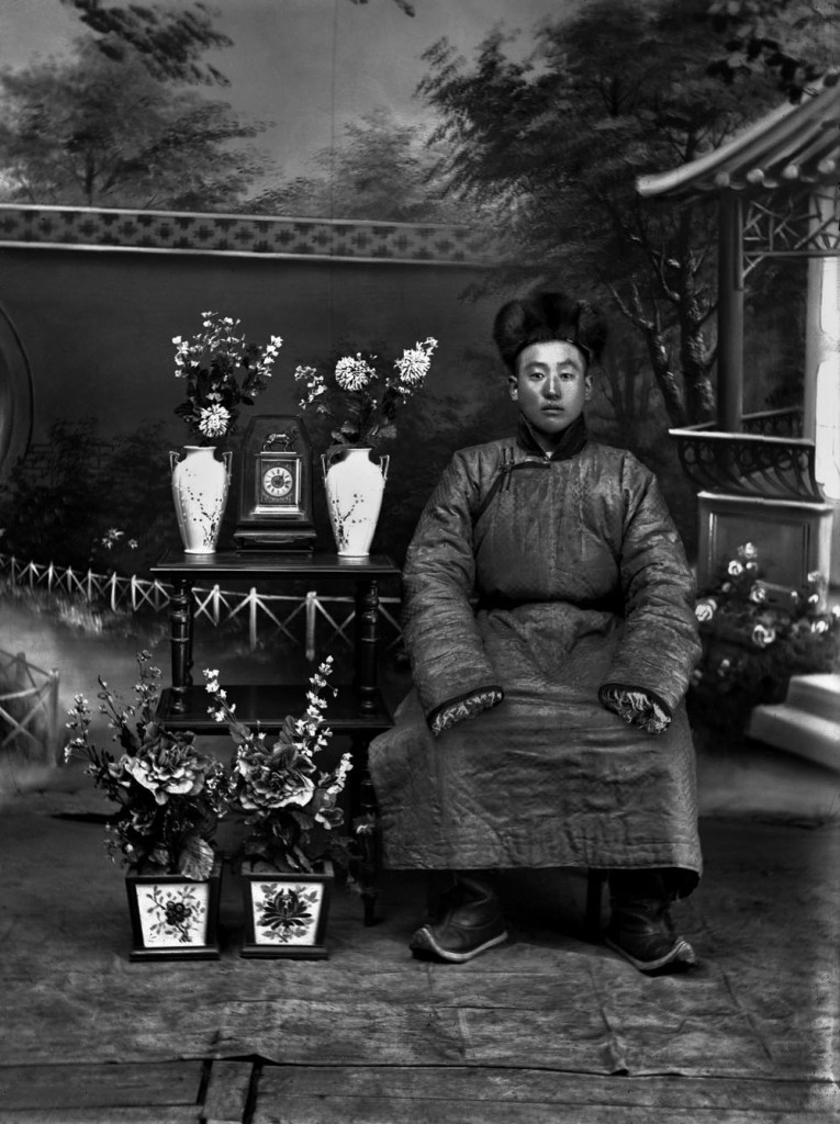 Unknown photographer. 'Untitled [Mongolian man with two vases and clock]' 1910s-1920s