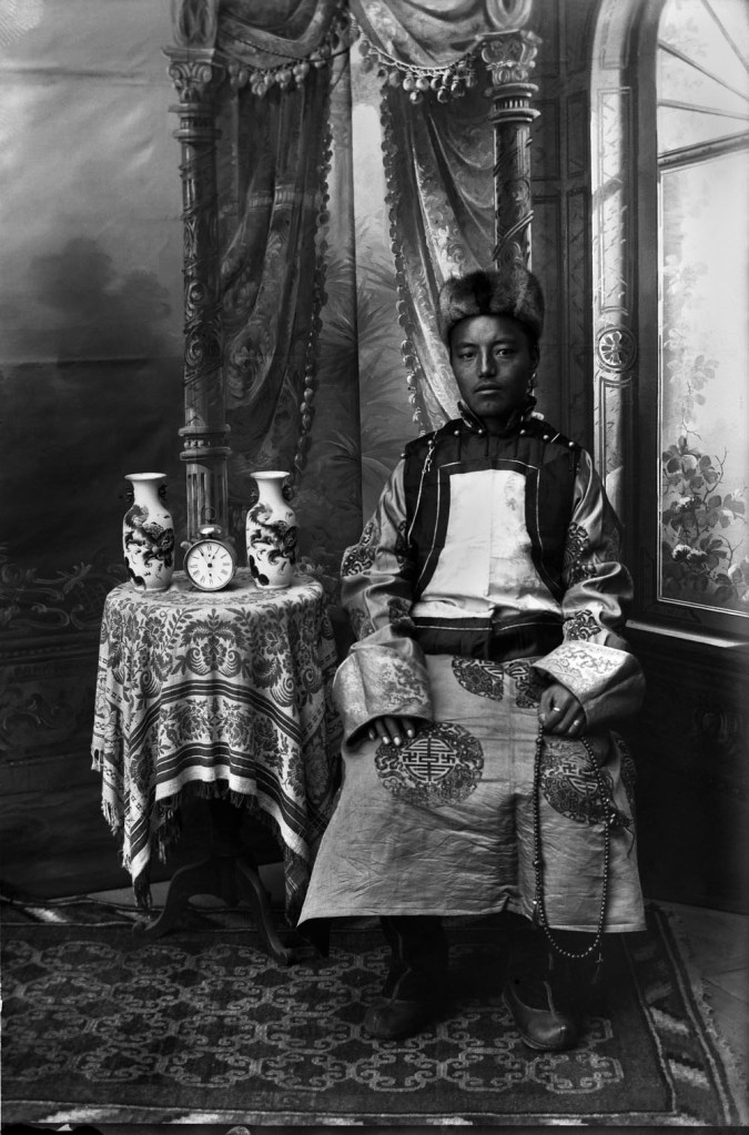 Unknown photographer. 'Untitled [Mongolian man with cut-out pedestal]' 1910s-1920s