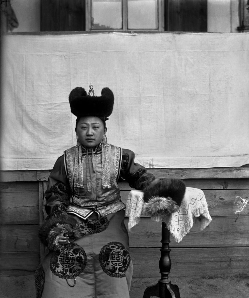 Unknown photographer. 'Untitled [Mongolian woman and table]' 1910s-1920s