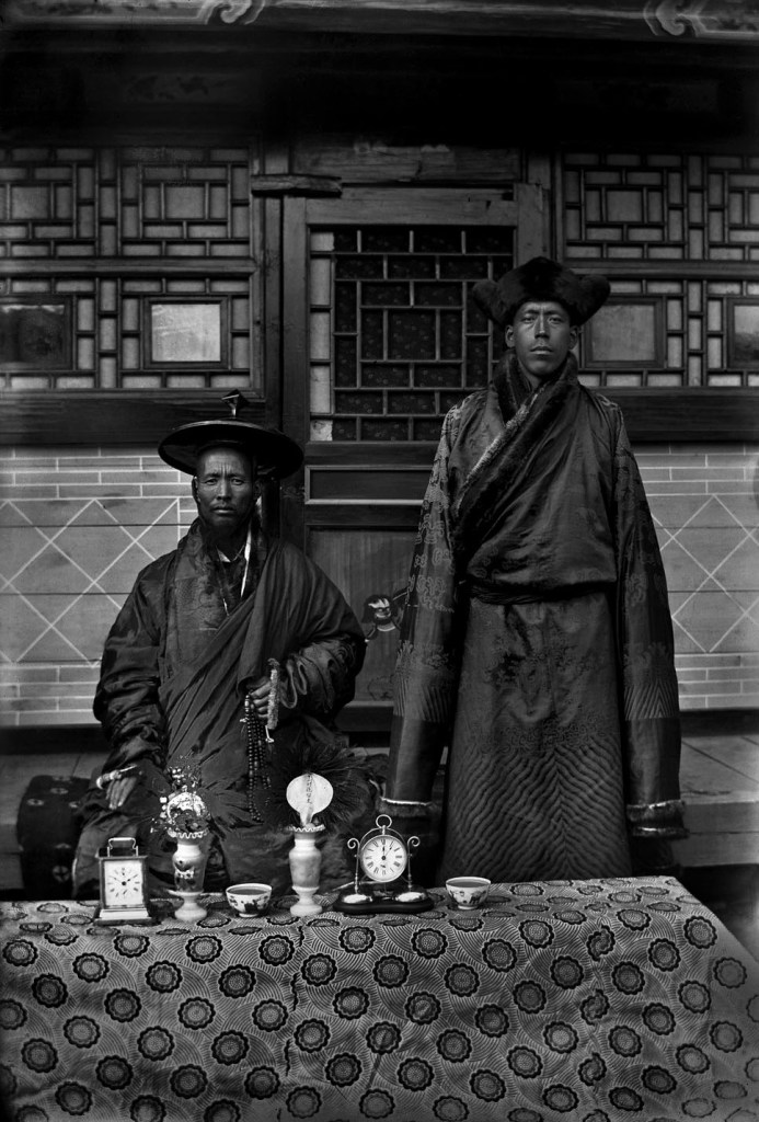 Unknown photographer. 'Untitled [Two Mongolian men with two clocks]' 1910s-1920s