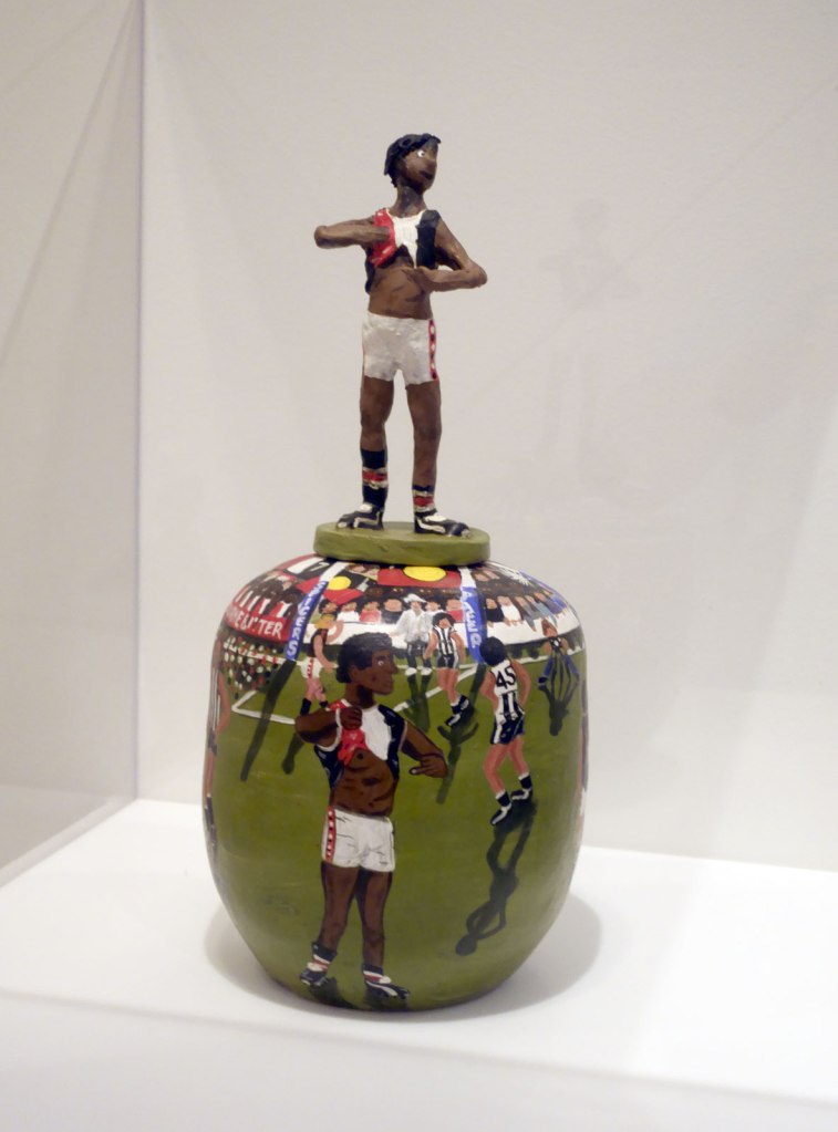 Rona Panangka Rubuntja (Australian / Arrente, b. 1970) 'I'm black (Nicky Winmar), covered vase' 2015 (installation view)