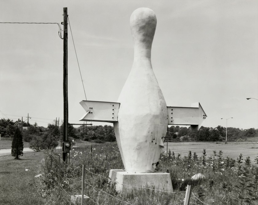 Jim Dow (American, b. 1942) 'Bowling Pin with Arrow. US 1, Branford, Connecticut' 1971
