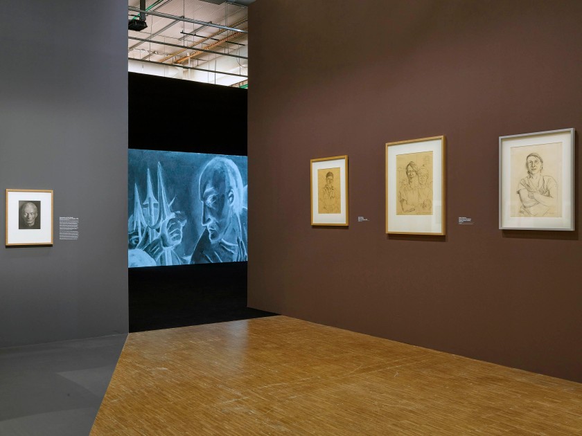 Installation view of the exhibition 'Germany / 1920s / New Objectivity / August Sander' at Centre Pompidou, Paris showing at right works by Rudolf Schlichter: from left to right, 'Arbeiter mit Mütze' (Worker with hat), 1926; 'Verstümmelte Proletarierfrau' (Mutilated proletarian woman), 1922-1923; and 'Schwachsinnige II' (Imbeciles II) 1923-1924