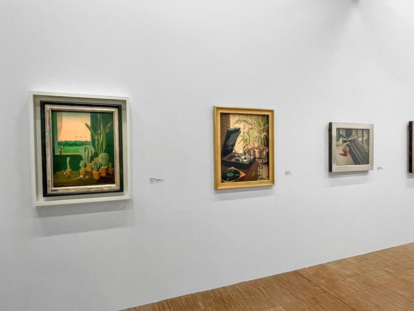 Installation view of the exhibition 'Germany / 1920s / New Objectivity / August Sander' at Centre Pompidou, Paris showing at left, Georg Scholz's 'Kacteen und Semaphore' (Cacti and semaphores) (1923); at centre, Rudolf Dischinger's 'Grammophon' (Gramophone) (1930); and at right, Franz Xaver Fuhr's 'Stillleben (Gummibaum)' (Still life (Rubber tree)) (c. 1925)