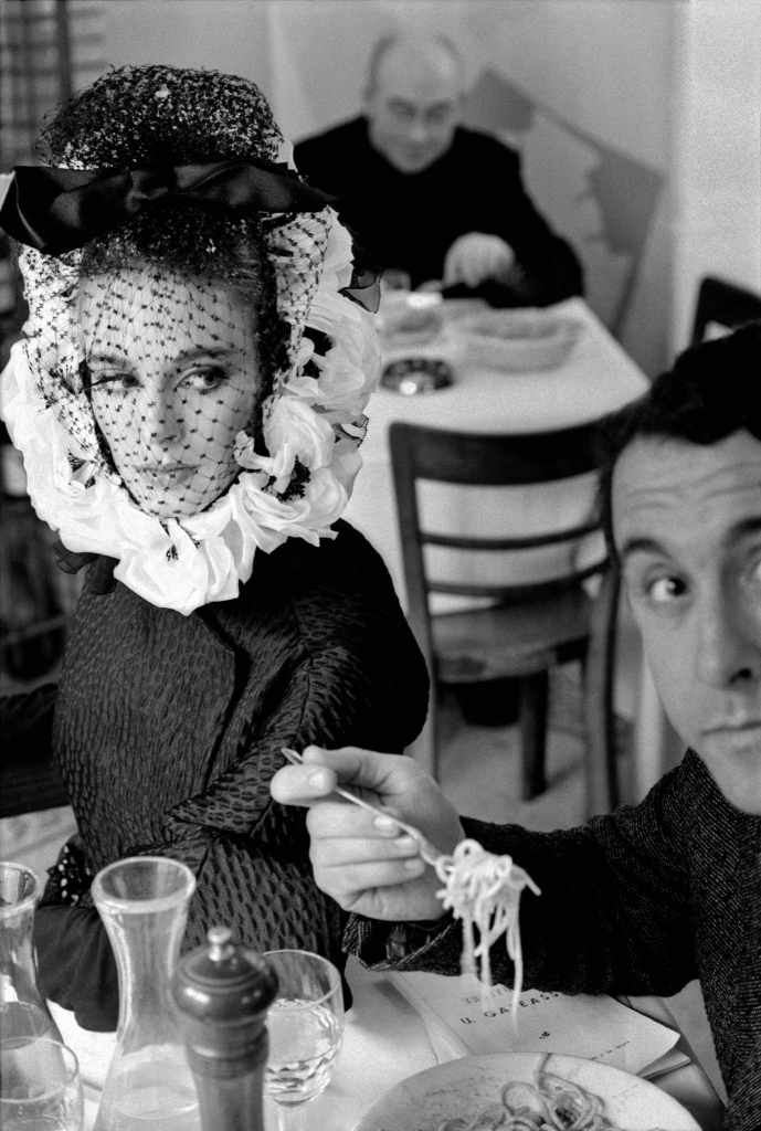 Frank Horvat (Italian, 1928-2020) 'Deborah Dixon eating spaghetti with writer Antero Piletti, Italian haute couture, Rome, Italy, for Harper's Bazaar' 1962