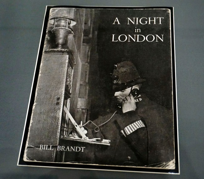 Installation view of the cover of Bill Brandt's photobook 'A Night in London' (1937) from the exhibition 'Bill Brandt: Inside the Mirror' at Tate Britain, London, October 2022 - January 2023