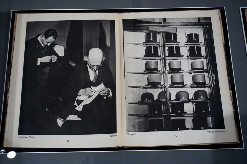 Installation view of the exhibition 'Bill Brandt: Inside the Mirror' at Tate Britain, London, October 2022 - January 2023 showing 'Middle-class Tailors' and 'Toppers' from 'The English At Home' (1936)