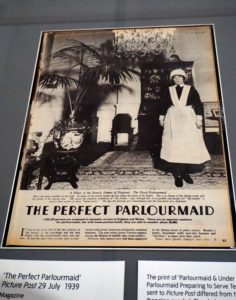 Installation view of the exhibition 'Bill Brandt: Inside the Mirror' at Tate Britain, London, October 2022 - January 2023 showing 'The Perfect Parlourmaid' from 'Picture Post' magazine 29 July 1939