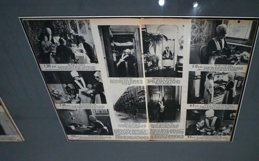 Installation view of the exhibition 'Bill Brandt: Inside the Mirror' at Tate Britain, London, October 2022 - January 2023 showing a double page magazine spread 'The Perfect Parlourmaid' from 'Picture Post' magazine 29 July 1939 featuring photographs from 'The English at Home' (1936)