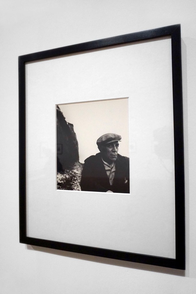 Installation view of the exhibition 'Bill Brandt: Inside the Mirror' at Tate Britain, London, October 2022 - January 2023 showing Brandt's photograph 'Georges Braque on the beach at Varengeville, Normandy' (1955)