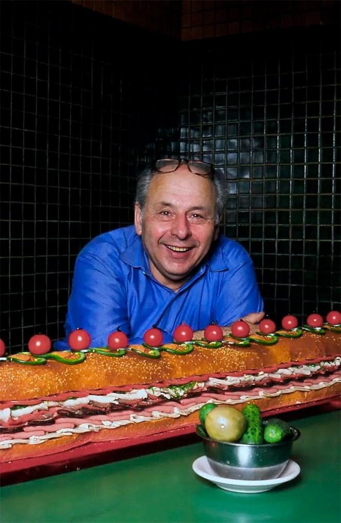 Unknown photographer (American) 'Abe Lebewohl with hero, from the 2nd Ave Deli, New York, NY' c. 1990