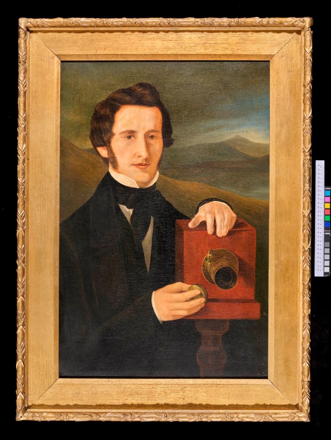 Artist unknown (England) 'Portrait of a man (resembling Jabez Hogg) operating a daguerreotype camera' c. 1845