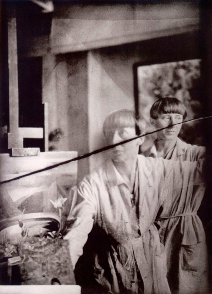 Hannah Höch (German, 1889-1978) 'Untitled (Hannah Höch at her easel, The Hague; self-portrait (double exposure) with the painting Symbolic Landscape III)' 1930 Hannah Höch (German, 1889-1978) 'Untitled (Hannah Höch at her easel, The Hague; self-portrait (double exposure) with the painting Symbolic Landscape III)' 1930