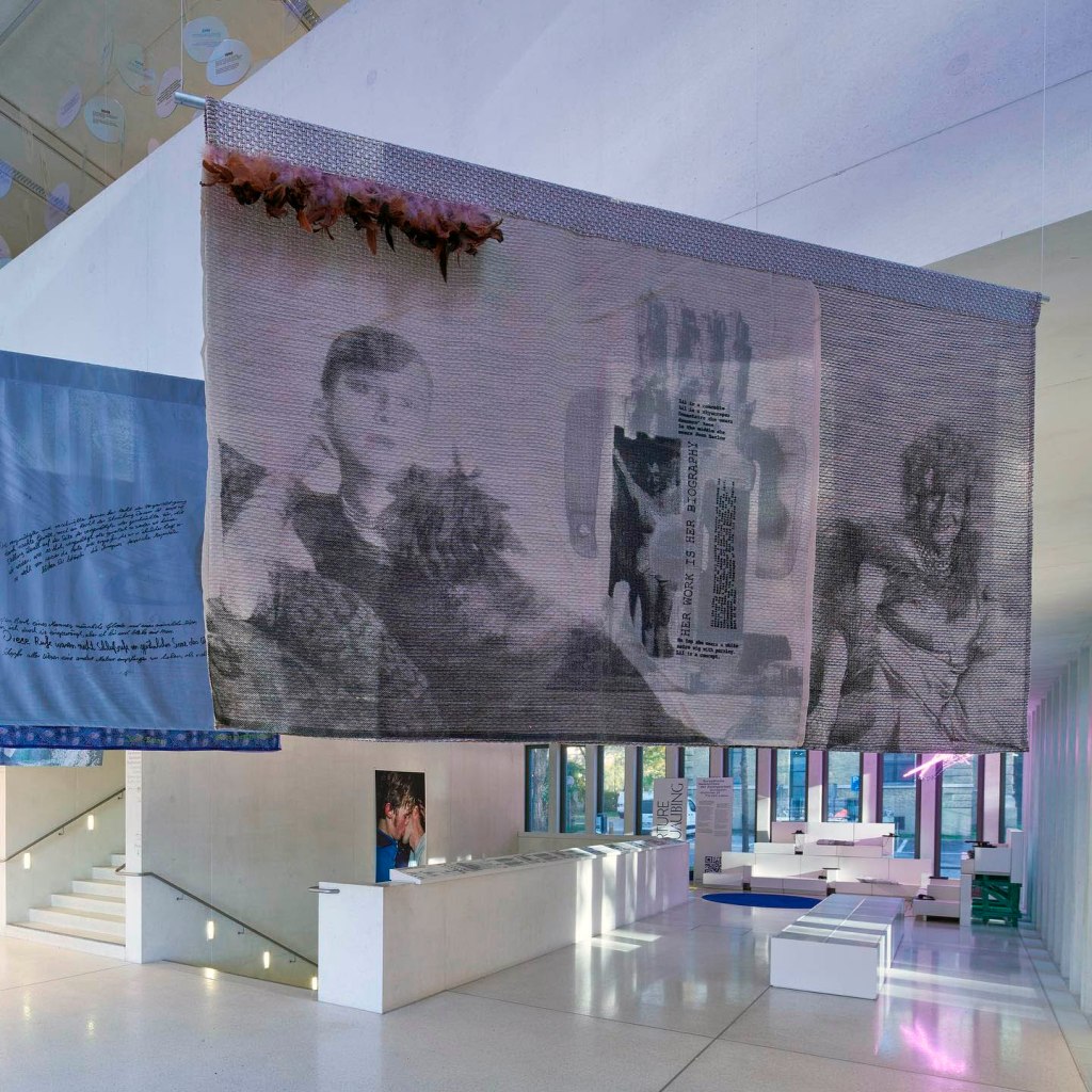 Installation view of the exhibition 'TO BE SEEN: Queer Lives 1900-1950' at the Munich Documentation Center for the History of National Socialism showing work from Philipp Gufler's series 'Quilts' Installation view of the exhibition 'TO BE SEEN: Queer Lives 1900-1950' at the Munich Documentation Center for the History of National Socialism showing work from Philipp Gufler's series 'Quilts'