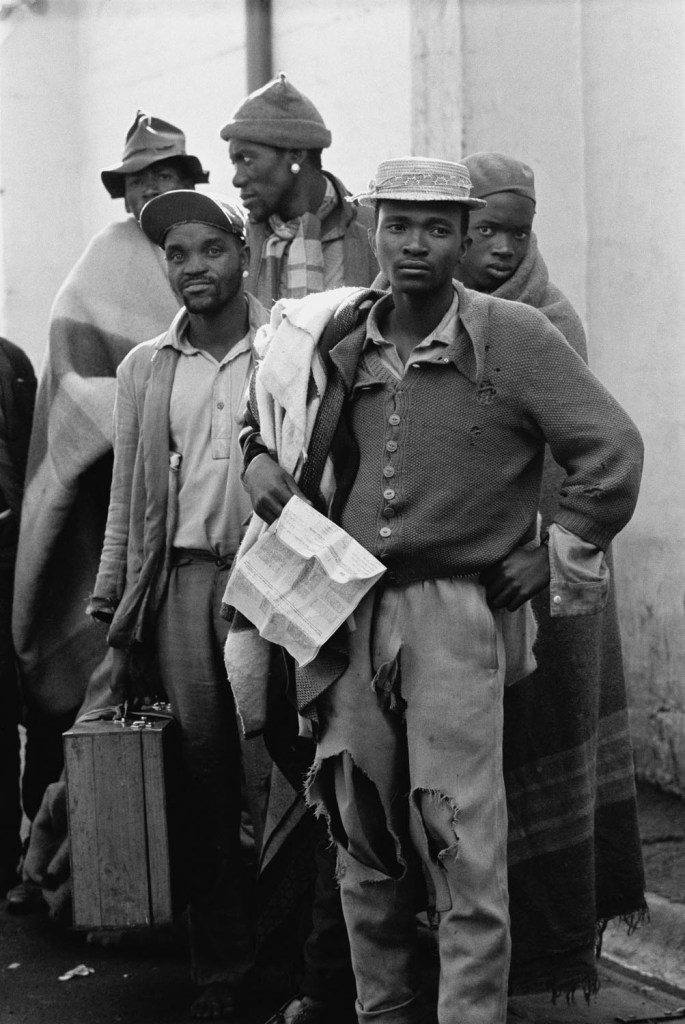 Ernest Cole (South African, 1940-1990) 'Pensive tribesmen, newly recruited to mine labour, awaiting processing and assignment' 1960-1966 from the exhibition 'Ernest Cole: House of Bondage' at Foam, Amsterdam, Jan - June, 2023