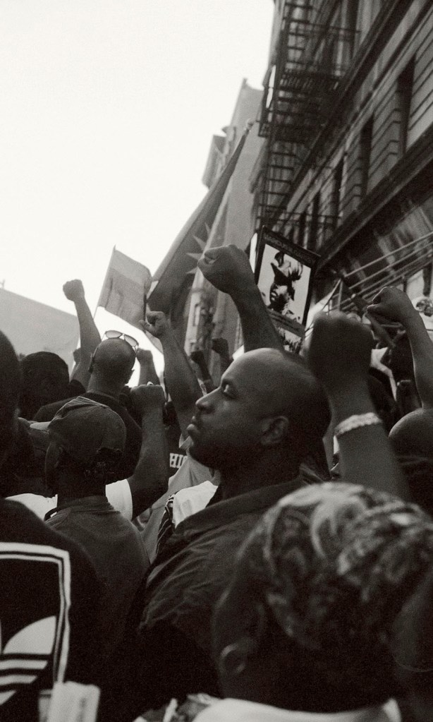 Ming Smith (American, b. 1950) 'Million Youth March, Raised Fists, Harlem, New York' 1998
