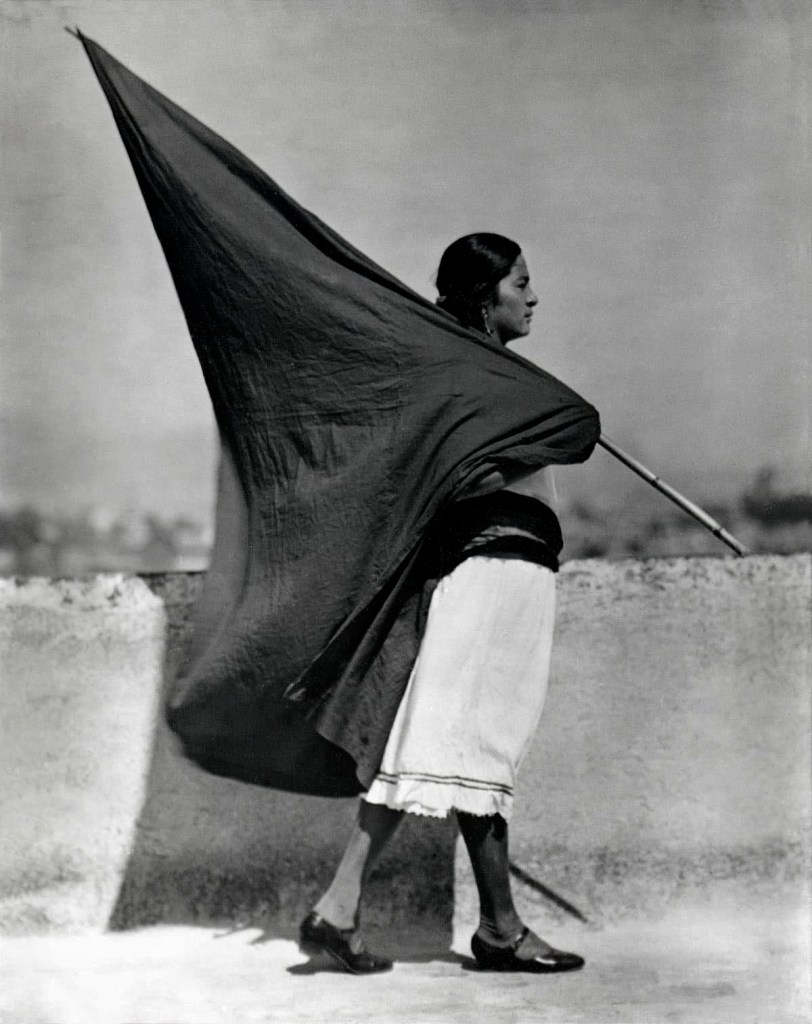 Tina Modotti (Italian, 1896-1942) 'Woman with flag' México City, c. 1928
