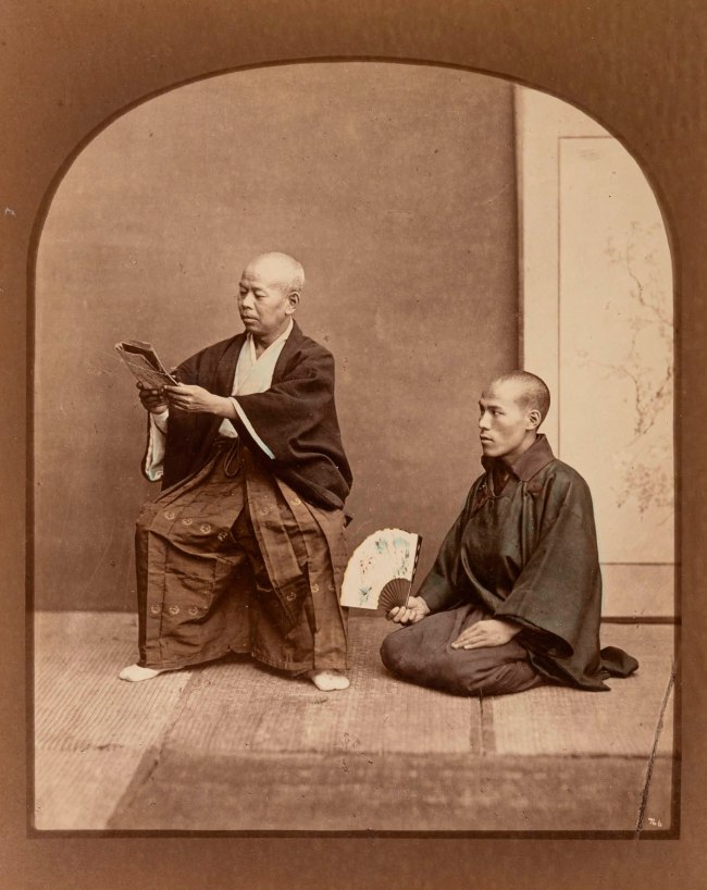 Baron Raimund von Stillfried (Austrian, 1839-1911) 'Untitled (Accountant with newspaper and his servant with folding fan)' 1870s