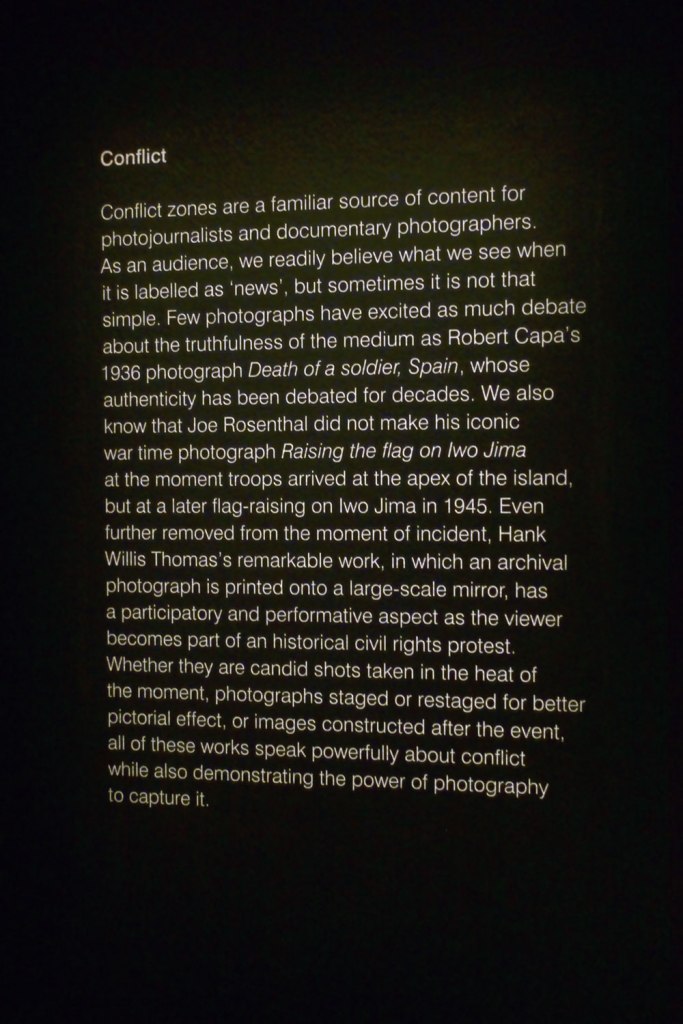 Conflict wall text from the exhibition