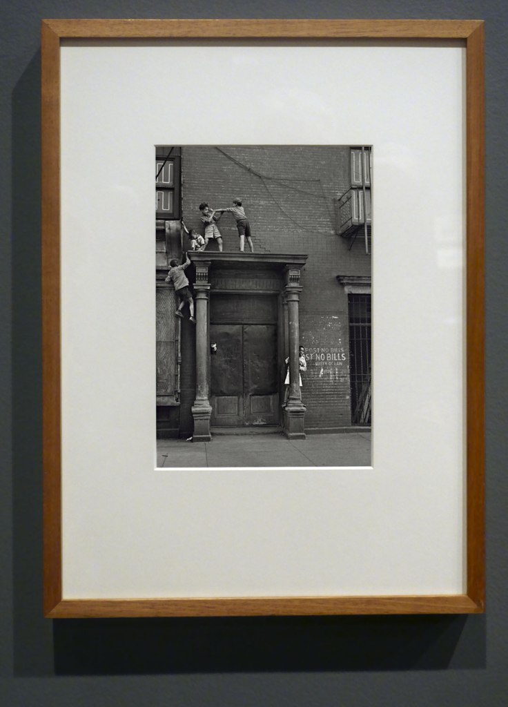 Installation view of the exhibition 'Photography: Real & Imagined' at The Ian Potter Centre: NGV Australia, Melbourne showing Helen Levitt's 'New York (Boys fighting on a pediment)' c. 1940