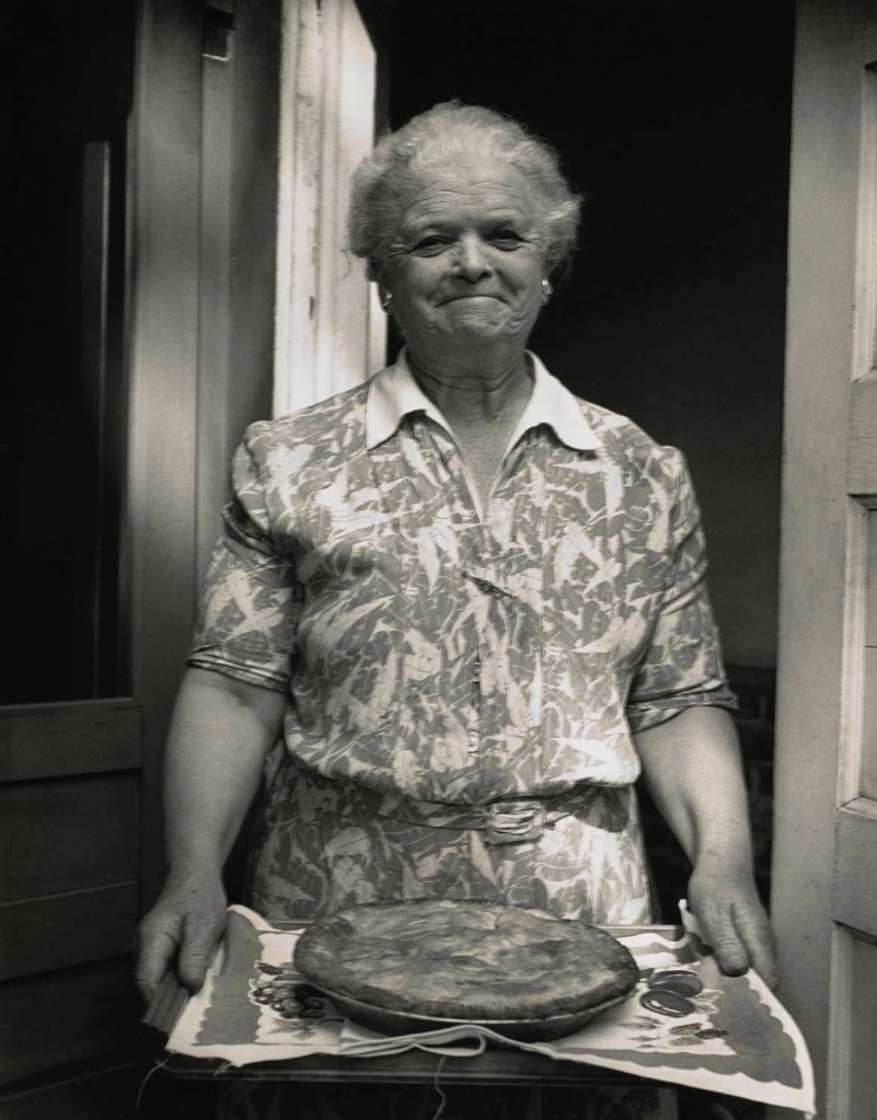 Dorothea Lange (American, 1895-1965) 'Lyde Wall, friend and neighbor, who makes "the world's best apple pie," and knows everything going on for miles around, Berkeley, California' from 'The American Country Woman' 1944