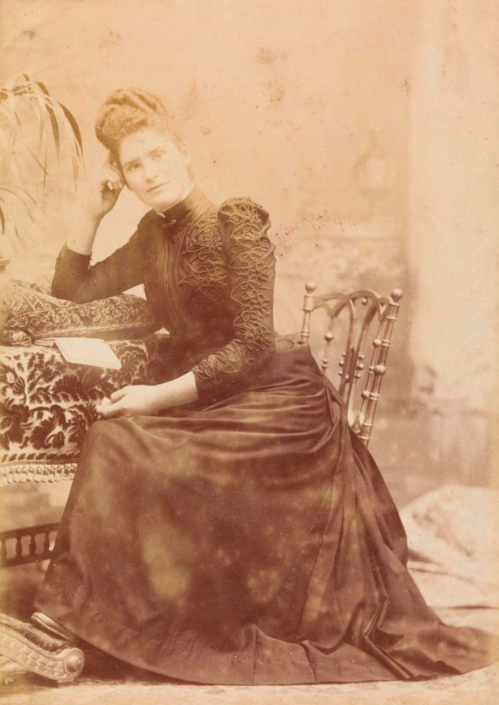 F. B. Mendelssohn & Co., Melbourne (Australian, active 1889-1900) 'No title (Young woman, full length, seated at plush covered table)' 1889