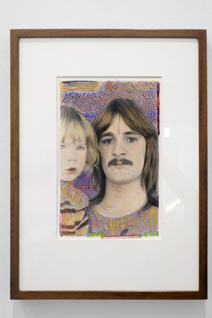 Installation view of the exhibition 'Photography: Real & Imagined' at The Ian Potter Centre: NGV Australia, Melbourne showing Micky Allan's 'Man holding his daughter' (1982) from the 'People of Elizabeth' series 1982-1983