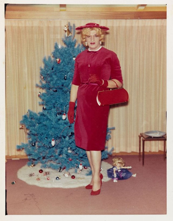 Attributed to Andrea Susan. 'Gloria in a red suit at home, Clarion, Michigan' 1962