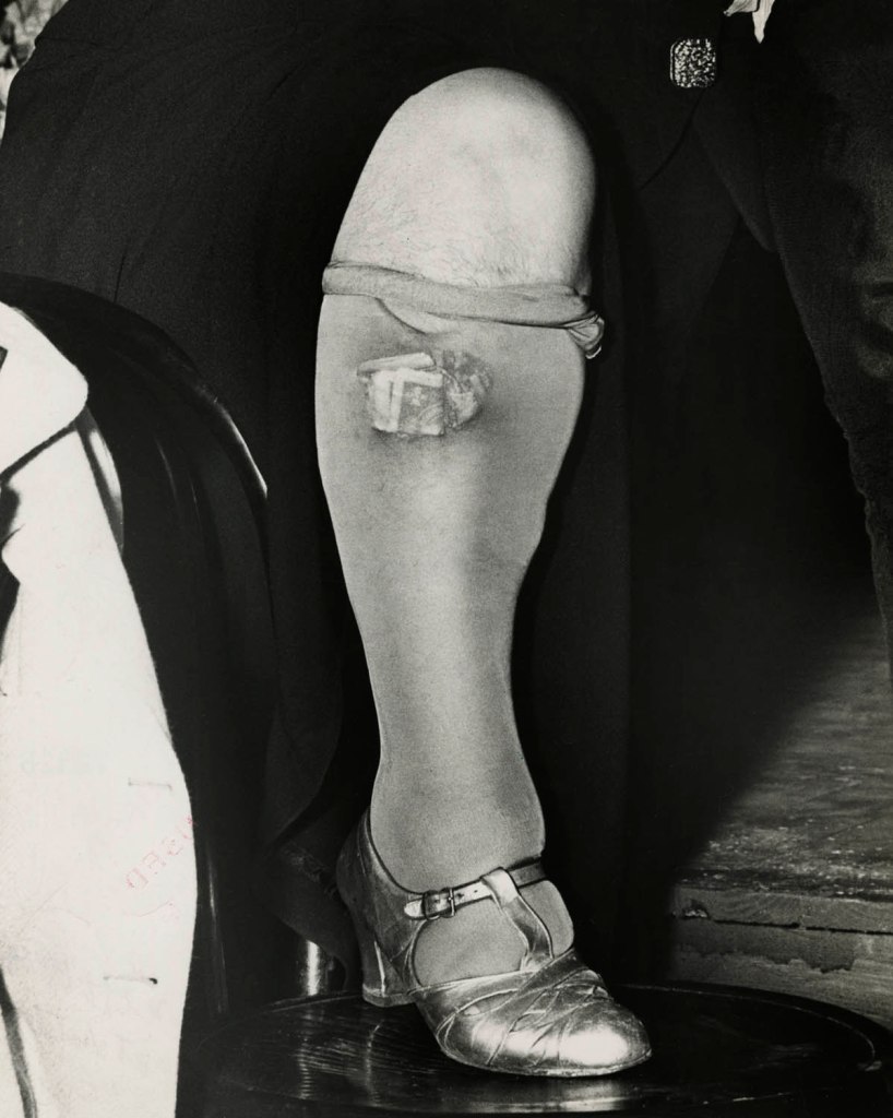 Weegee (American, 1899-1968) 'Ladies keep their money in their stockings...' 1944